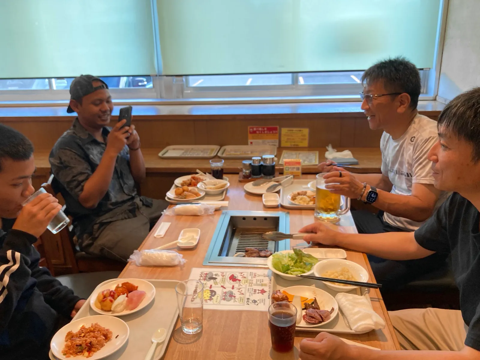 AYAME team members sharing a meal together